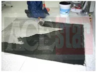 ESD tile repair in progress