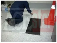 ESD tile repair in progress